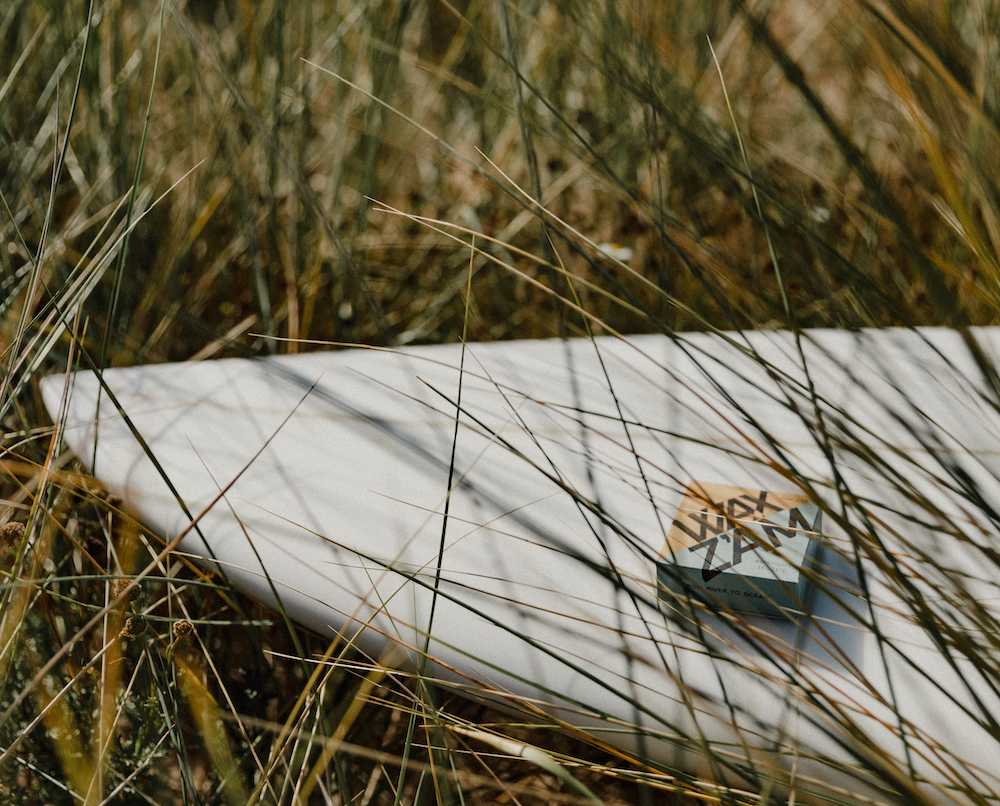 waxzam surfboard in field